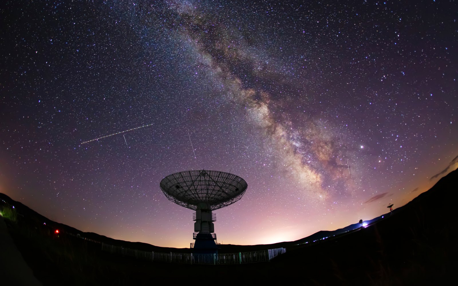 Radio telescope under the night sky